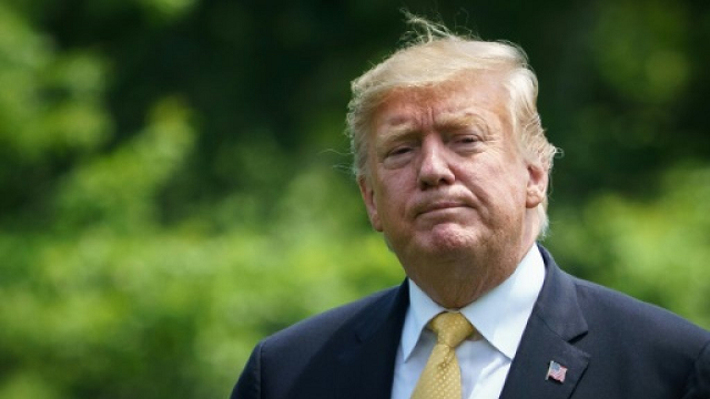 us president donald trump walks across the south lawn of the white house after returning from japan photo afp