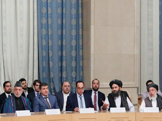 officials including afghan former president hamid karzai l head of political office of taliban mohammad abbas stanikzai 2nd r and taliban chief negotiator mullah abdul ghani baradar 3rd r attend peace talks in moscow russia may 30 2019 photo reuters