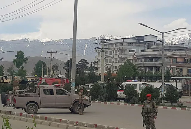 afghan security personnel arrive near a site of an attack near the marshal fahim military academy base in kabul on may 30 2019 photo afp afghan security personnel arrive near a site of an attack near the marshal fahim military academy base in kabul on may 30 2019 photo afp