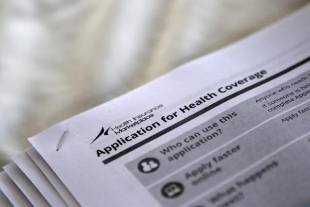 representational image showing a form for health coverage photo reuters representational image showing a form for health coverage photo reuters