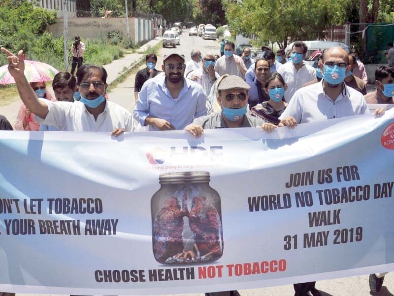 an ngo holds walk on world no tobacco day photo express