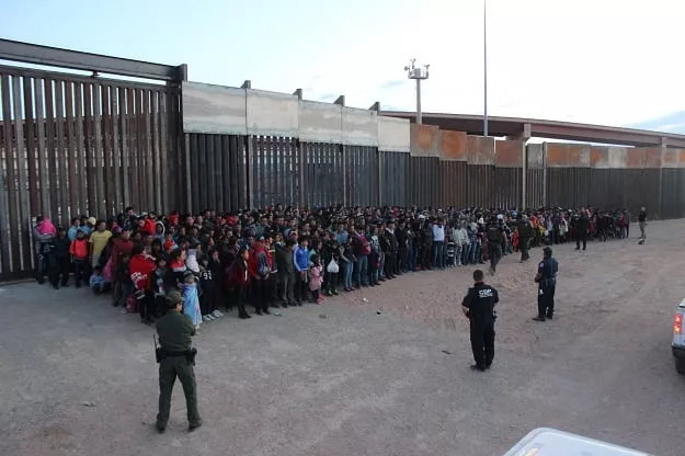 this image released by us border and custom protection on their flickr account on may 30 2019 shows a group of migrants apprehended after crossing the border from mexico on may 29 2019 photo us customs and border protection afp this image released by us border and custom protection on their flickr account on may 30 2019 shows a group of migrants apprehended after crossing the border from mexico on may 29 2019 photo us customs and border protection afp