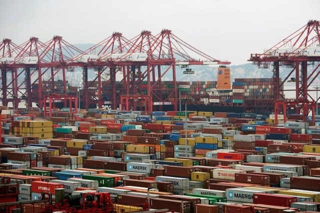 containers are seen at the yangshan deep water port in shanghai china april 24 2018 photo reuters containers are seen at the yangshan deep water port in shanghai china april 24 2018 photo reuters
