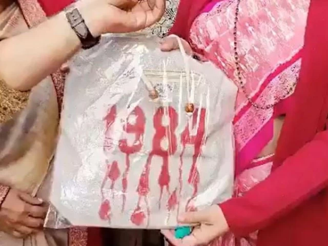 bjp lok sabha mp from odisha aparajita sarangi with a bag 1984 written on it in red and handed it over to congress mp priyanka gandhi photo the hindu bjp lok sabha mp from odisha aparajita sarangi with a bag 1984 written on it in red and handed it over to congress mp priyanka gandhi photo the hindu