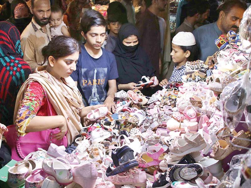 rupee plunge keeps families away from imported items this eid