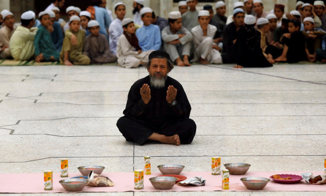 a man prays before breaking his fast during the fasting month of ramadan in peshawar pakistan may 6 2019 photo reuters a man prays before breaking his fast during the fasting month of ramadan in peshawar pakistan may 6 2019 photo reuters