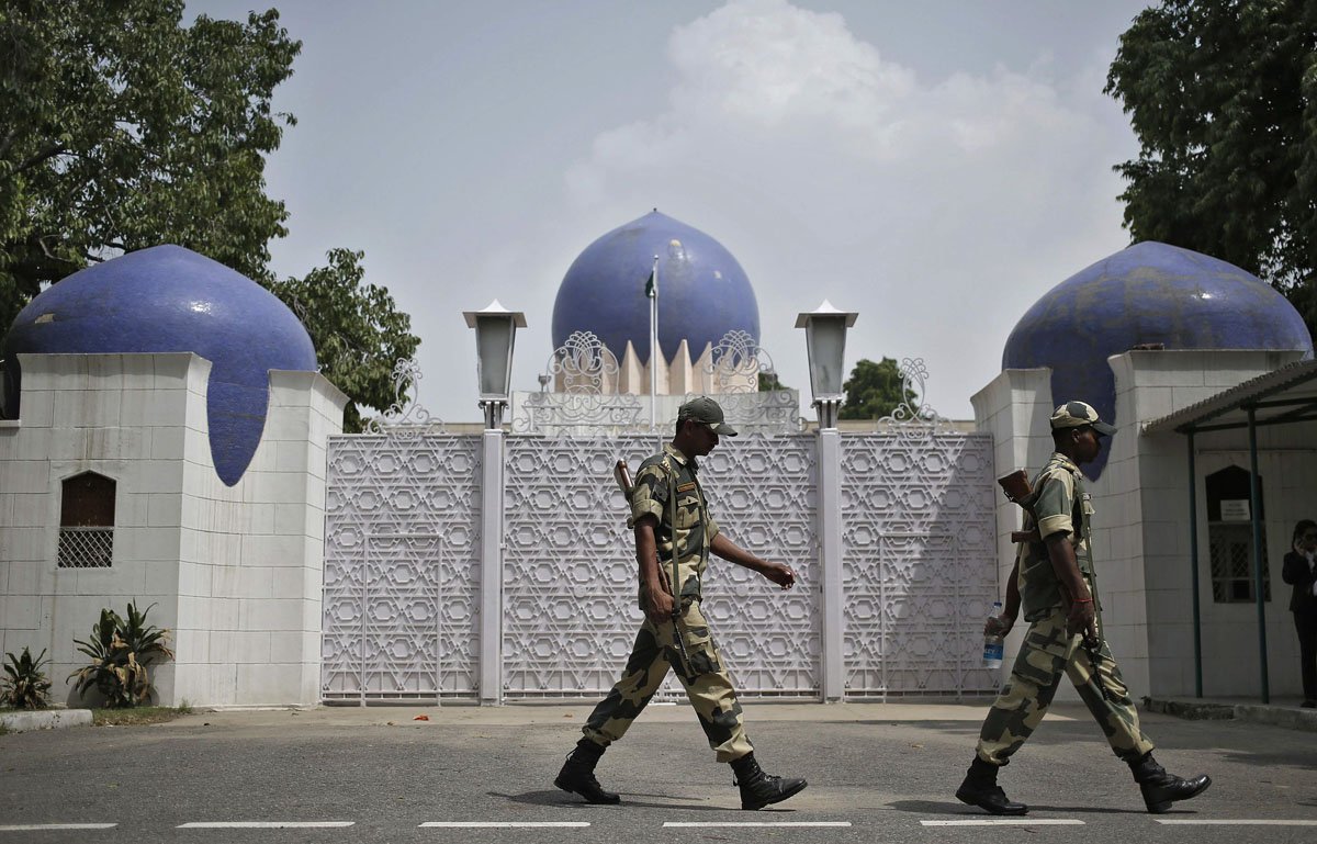 security officials walk past the pakistani high commission in new delhi photo afp