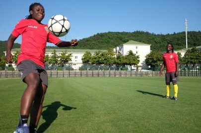 african twin sisters tackle chinese football together