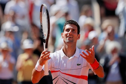 french open djokovic powers into record 10th straight quarter final