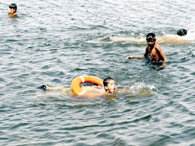 children enjoy a swim at china creek on a hot summer day to beat the heat photo ppi children enjoy a swim at china creek on a hot summer day to beat the heat photo ppi