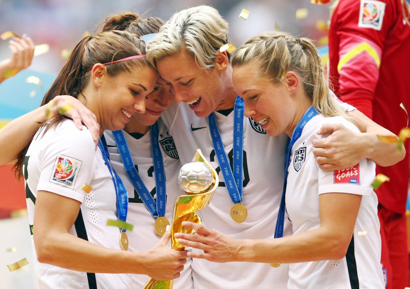 united states alex morgan lauren holiday abby wambach and whitney engen celebrate winning the world cup following the fifa women 039 s world cup canada 2015 final match between usa and japan at bc place stadium in vancouver canada photo reuters