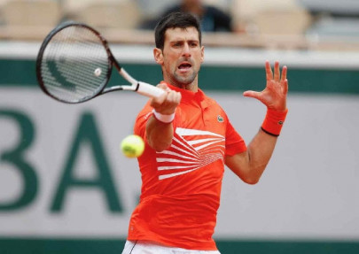djokovic sets roland garros last eight record as halep wins in 45 minutes