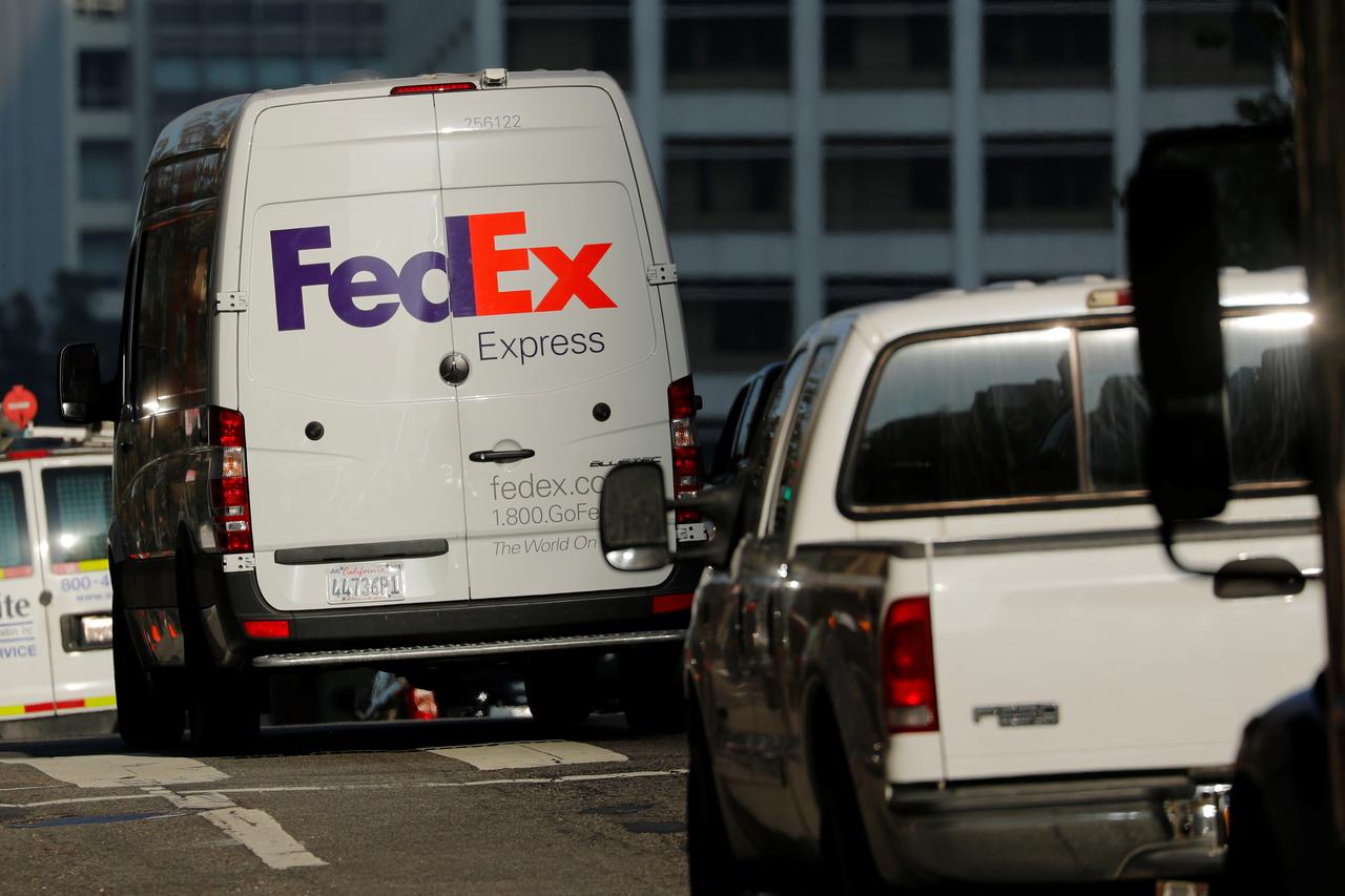 a federal express delivery truck is shown in downtown los angeles california us photo reuters