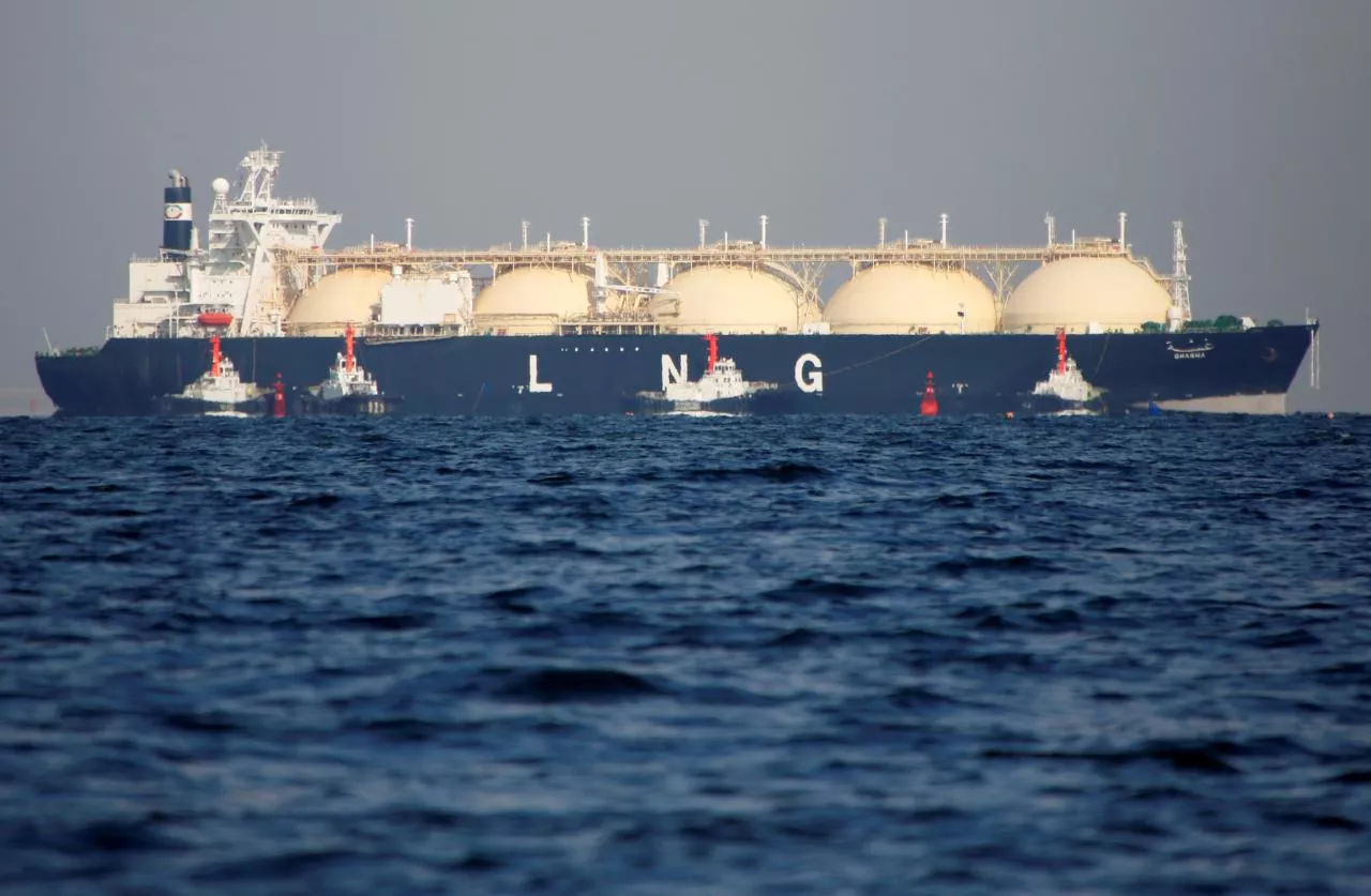 a liquefied natural gas lng tanker is tugged towards a thermal power station photo reuters a liquefied natural gas lng tanker is tugged towards a thermal power station photo reuters