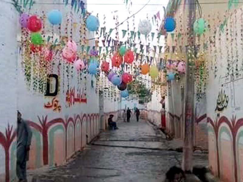 balloons and painted walls add colour to the nowshera locality photo express