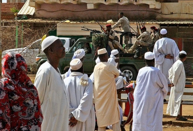 members of sudan 039 s security forces patrol as muslim worshippers attend eid al fitr prayers photo afp