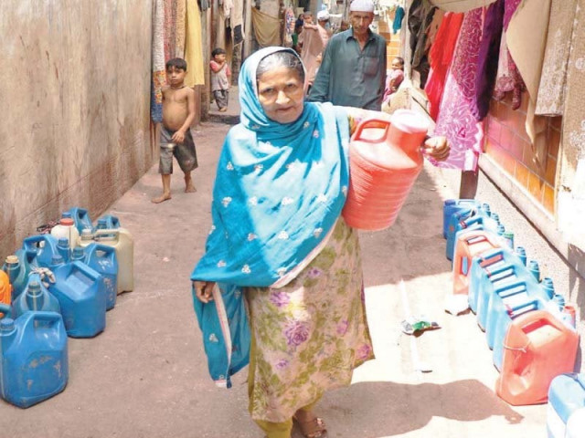 an elderly woman takes empty gallons to collect water residents in numerous areas remained deprived of water during eid and were forced to buy water at higher prices from private tanker owners photo file an elderly woman takes empty gallons to collect water residents in numerous areas remained deprived of water during eid and were forced to buy water at higher prices from private tanker owners photo file