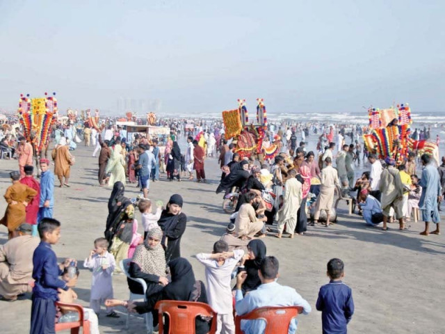 citizens thronged seaview beach in large numbers seeking respite from the scorching heat on friday photo ppi citizens thronged seaview beach in large numbers seeking respite from the scorching heat on friday photo ppi