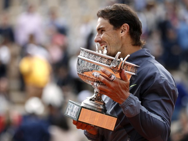spain 039 s rafael nadal celebrates with the trophy after his final match against austria 039 s dominic thiem photo reuters spain 039 s rafael nadal celebrates with the trophy after his final match against austria 039 s dominic thiem photo reuters