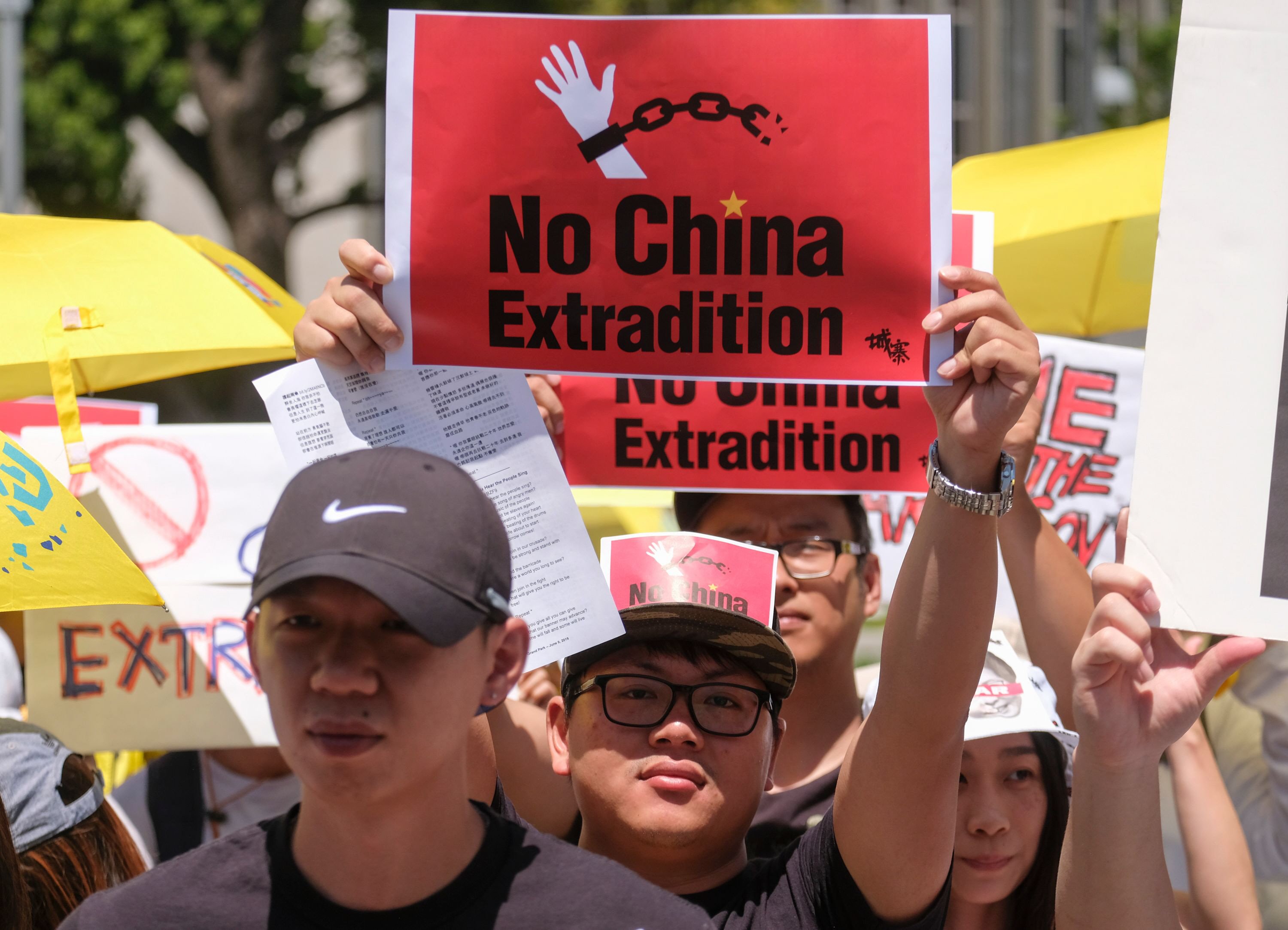 protesters march during a demonstration to protest against a controversial extradition law proposed by hong kong 039 s pro beijing government to ease extraditions to china in los angeles on june 9 2019