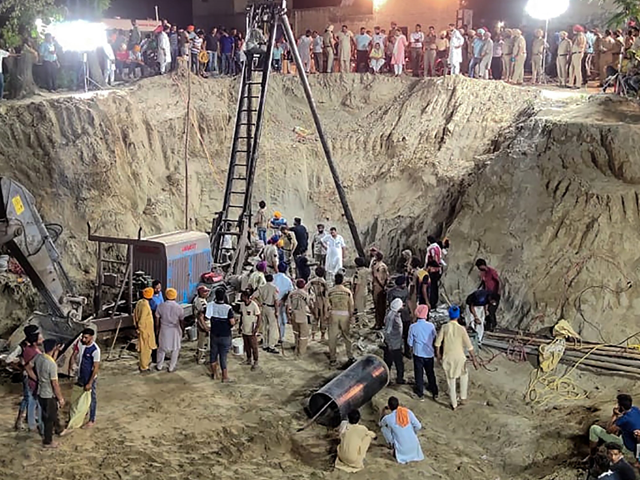an indian rescue team launches an operation to recover the body of fatehveer singh 2 who fell in a deep well on june 6 in sunam in the punjab district of sangrur photo afp