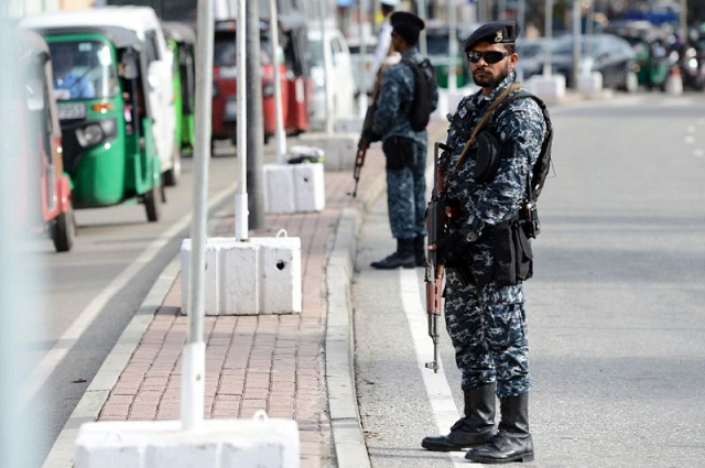 sri lankan security personnel stand guard outside the reopened st anthony 039 s church which was among the targets of easter sunday bombers whose actions left authorities in india alarmed that their country might be at risk of a militant attack photo afp