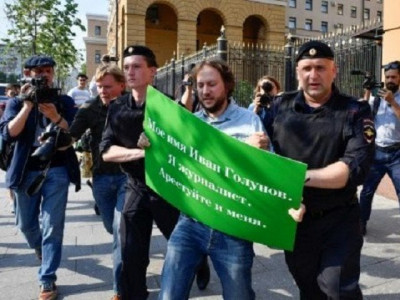 putin fires police generals over discredited case against journalist