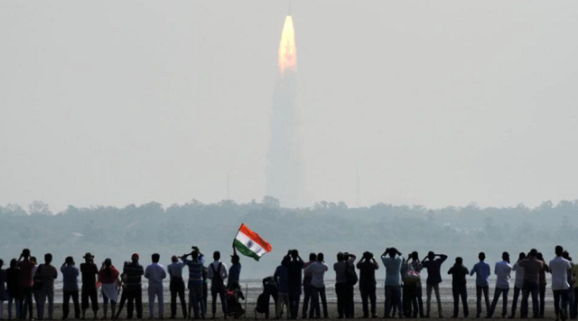indian onlookers watch the launch of the indian space research organisation isro polar satellite launch vehicle pslv c37 at sriharikota photo afp
