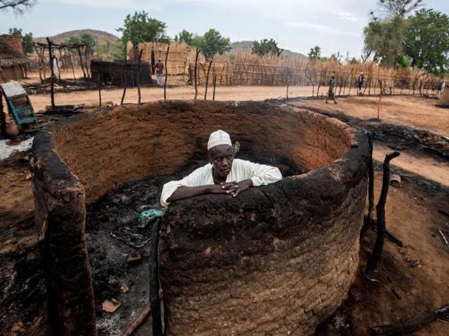 a man is seen inside a burnt house during clashes between nomads and residents in deleij village located in wadi salih locality central darfur sudan june 11 2019 photo reuters