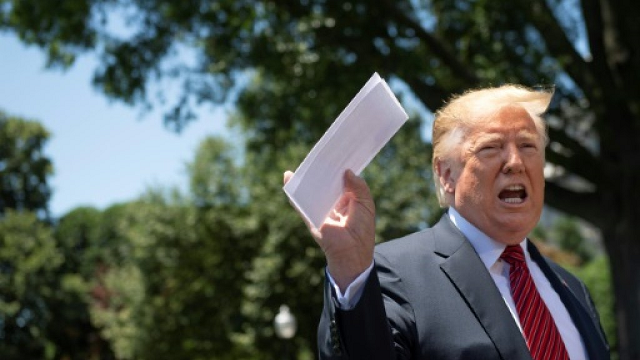 us president donald trump shows reporters a piece of paper that he said contained details of tough new concessions that he had extracted from mexico on the migration issue photo afp us president donald trump shows reporters a piece of paper that he said contained details of tough new concessions that he had extracted from mexico on the migration issue photo afp