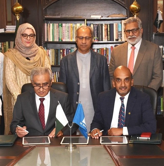 adviser to the premier on finance dr abdul hafeez shaikh witnessing the signing ceremony of loan agreements worth us 918 0 million with the world bank at islamabad on june 18 2019