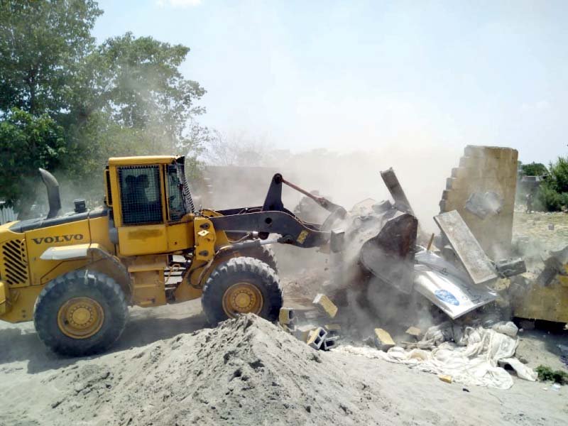 cda staff demolish encroachment in malpur photo express