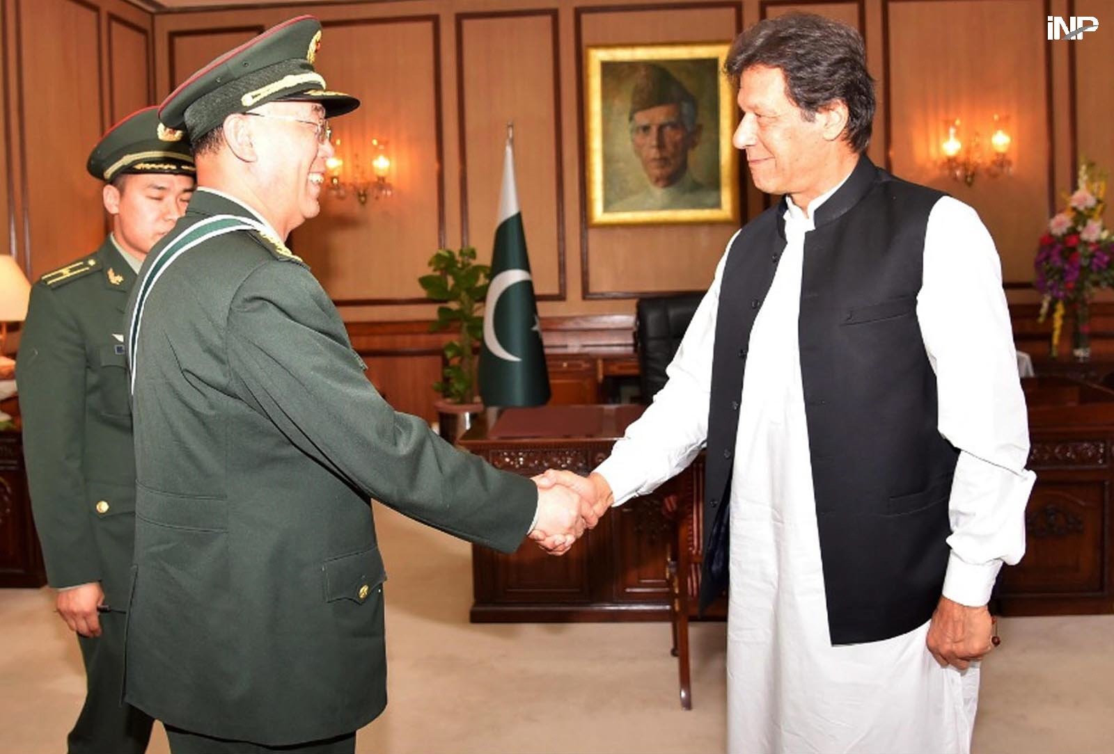 commander of china s people s liberation army gen han weiguo called on prime minister imran khan photo inp