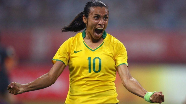 brazil set up a knockout stage clash with either hosts france or germany after the 74th minute strike moved marta one goal ahead of the german miroslav klose in the record books photo afp