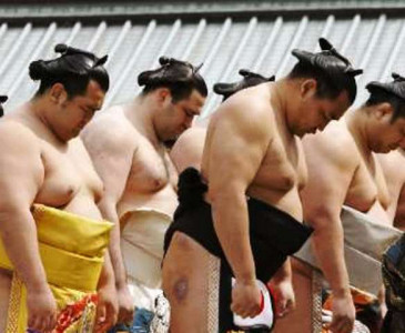 sumo wrestlers banned from golf courses asked to obey traffic laws