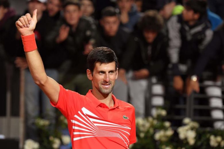 kyrgios more often in the headlines for what he says off the court than what he achieves on it described world number one djokovic as desperate to be held in the same high esteem as roger federer photo afp