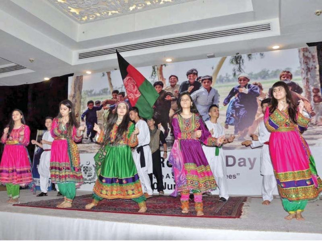children perform at an event organised by the unhcr and safron ministry to mark world refugees day photo app children perform at an event organised by the unhcr and safron ministry to mark world refugees day photo app