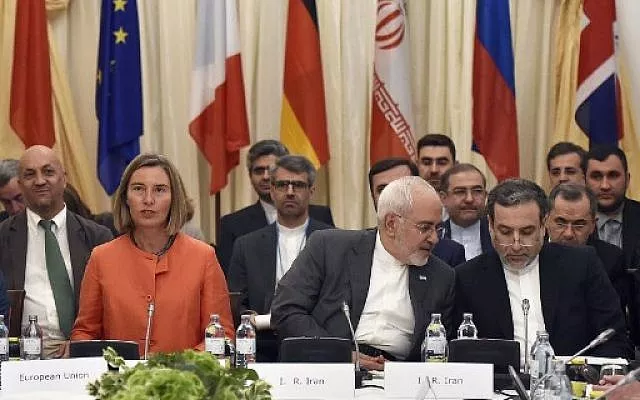 european union high representative for foreign affairs federica mogherini l iranian minister of foreign affairs mohammad javad zarif c and political deputy at the ministry of foreign affairs of iran abbas araghchi take part in a comprehensive plan of action jcpoa ministerial meeting on the iran nuclear deal on july 6 2018 in vienna austria photo afp european union high representative for foreign affairs federica mogherini l iranian minister of foreign affairs mohammad javad zarif c and political deputy at the ministry of foreign affairs of iran abbas araghchi take part in a comprehensive plan of action jcpoa ministerial meeting on the iran nuclear deal on july 6 2018 in vienna austria photo afp