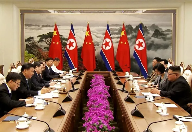 chinese president xi jinping 2l gestures during a historic meeting with north korean leader kim jong un r in pyongyang photo afp chinese president xi jinping 2l gestures during a historic meeting with north korean leader kim jong un r in pyongyang photo afp