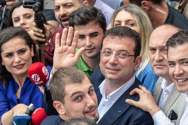 istanbul 039 s newly elected mayor ekrem imamoglu waves to supporters in istanbul photo afp