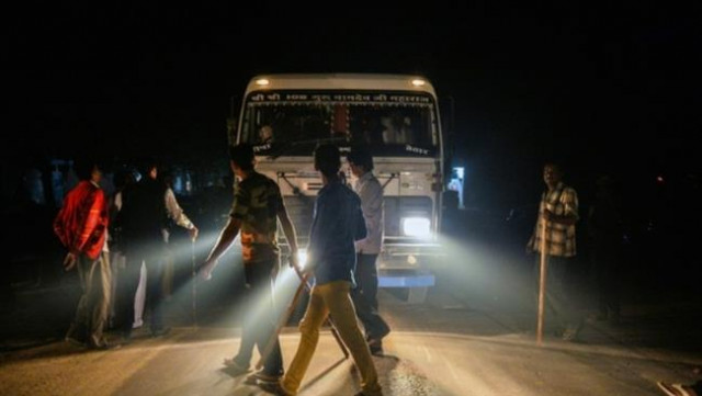 the file photo shows members of the vigilante group gau raksha dal cow protection squad inspect a truck on a highway in taranagar in the desert state of rajasthan india photo afp the file photo shows members of the vigilante group gau raksha dal cow protection squad inspect a truck on a highway in taranagar in the desert state of rajasthan india photo afp