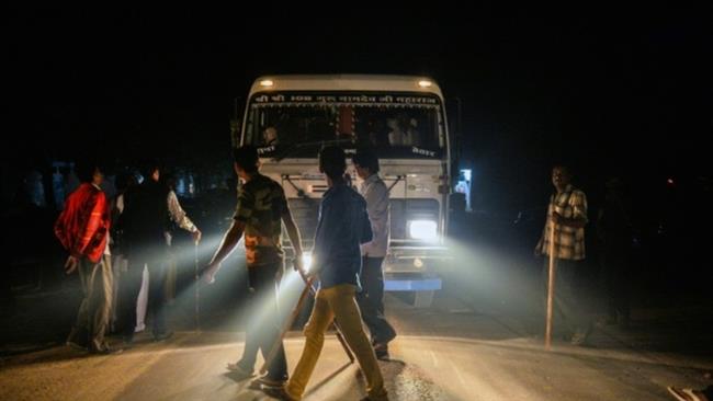 the file photo shows members of the vigilante group gau raksha dal cow protection squad inspect a truck on a highway in taranagar in the desert state of rajasthan india photo afp