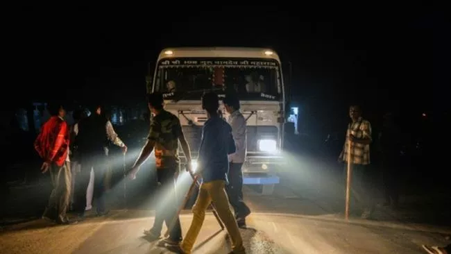 the file photo shows members of the vigilante group gau raksha dal cow protection squad inspect a truck on a highway in taranagar in the desert state of rajasthan india photo afp