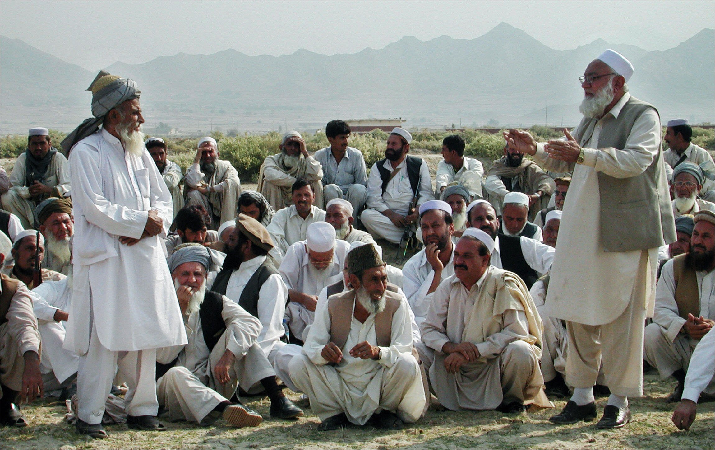 pakistani tribal elder gather to attend a jirga or 039 tribal assembly 039 in the mohmand agency a town bordering afghanistan 24 october 2007 to discuss the ongoing unrest situation pakistan and afghanistan will hold the first meeting of a tribal council early next month to discuss border security amid an upsurge in taliban linked violence some 50 tribal elders from both nations will meet in islamabad to talk about securing stability and trying to make contact with moderate taliban who have agreed to accept the rule of law an official said afp photo str photo credit should read str afp getty images