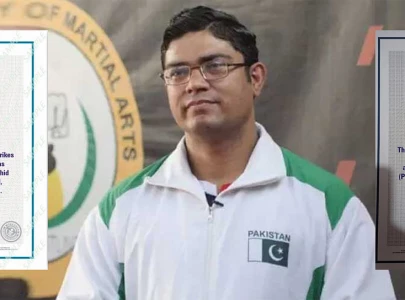 pakistan s rashid naseem sets world record by crushing 39 cans in 30 seconds pakistan s rashid naseem sets world record by crushing 39 cans in 30 seconds