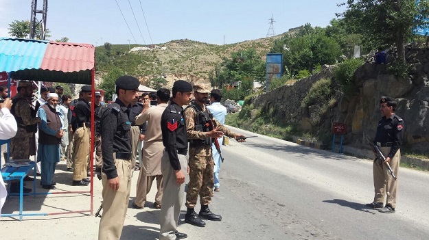 K-P police takes over the check post. PHOTO: EXPRESS