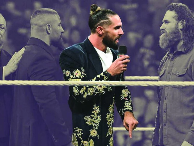 rollins donned the coat for monday night raw photo file rollins donned the coat for monday night raw photo file
