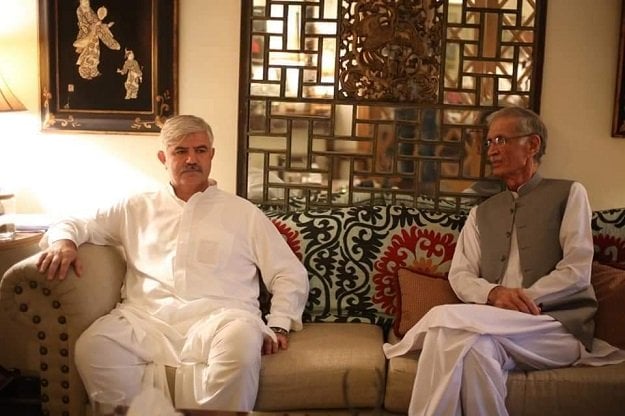 incumbent k p cm mehmood khan with his predecessor and current federal minister for defence pervez khattak photo twitter