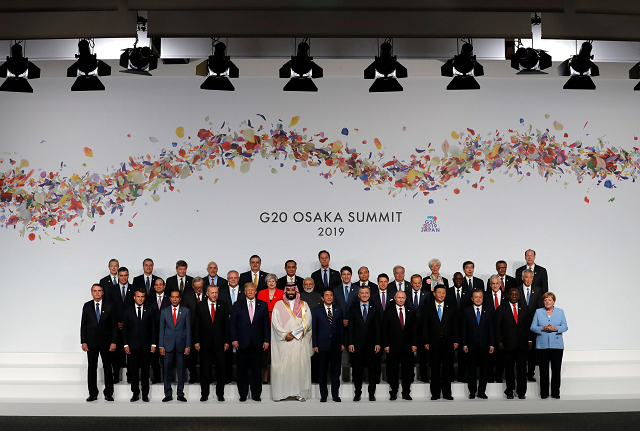 leaders pose for a family photo at the g20 summit in osaka on june 28 2019 photo afp