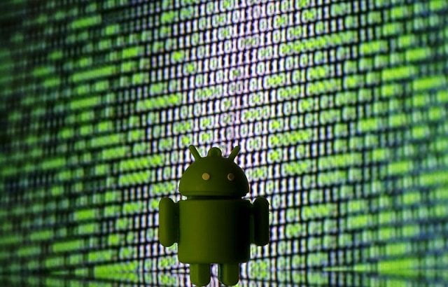 a 3d printed android logo is seen in front of a displayed cyber code in this illustration taken march 22 2016 photo reuters